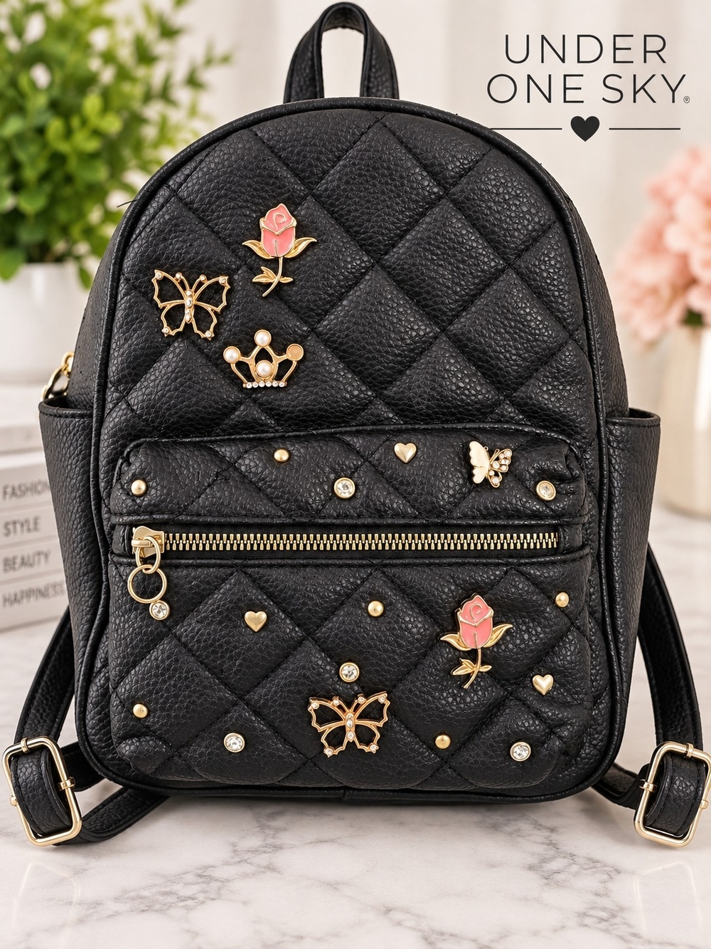 Under One Sky Black Quilted Mini Backpack with Gold Accents and Pink Rose Pins